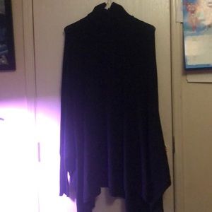 Black poncho w/ sleeves &  studs on the sleeve